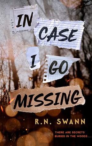In Case I Go Missing (US Cover) A collection of different ripped papers reading "In Case I Go Missing" on a backdrop of spooky bare trees and sparks from a fire.